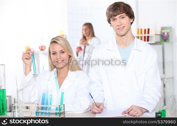 young woman and young man in a laboratory