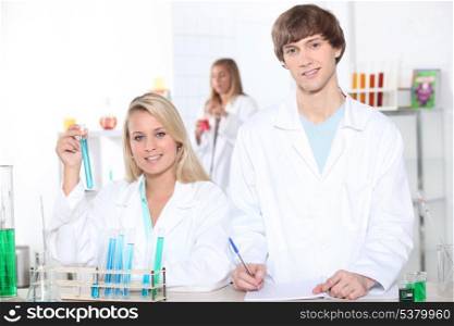 young woman and young man in a laboratory