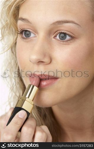 Young Woman Applying Make-Up
