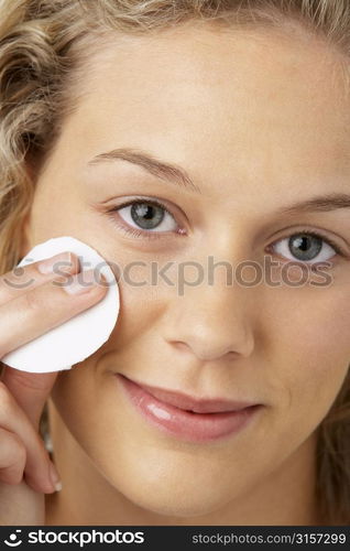 Young Woman Applying Make-Up