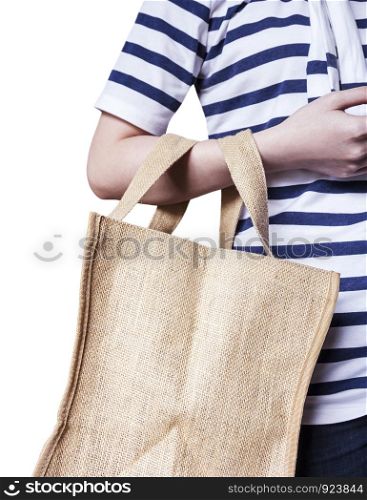 Young woman are carrying sackcloth shopping bag on white background