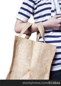 Young woman are carrying sackcloth shopping bag on white background