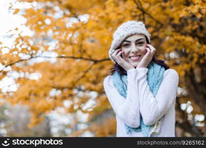 Young woman at autumn forest