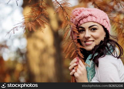 Young woman at autumn forest