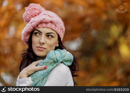 Young woman at autumn forest