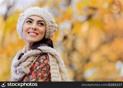 Young woman at autumn forest