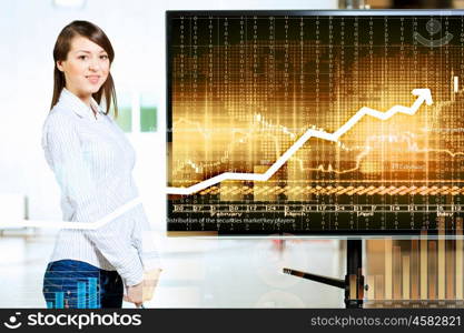 Young woman at presentation. Image of young woman making presentation on screen