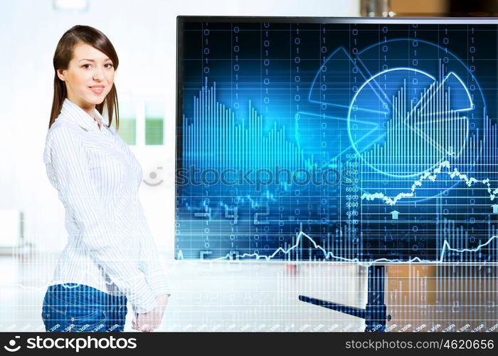 Young woman at presentation. Image of young woman making presentation on screen