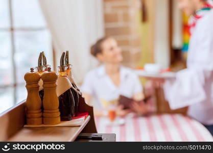 Young woman at restaurant. Young woman at restaurant sitting at table