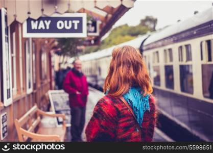 Young woman at train station