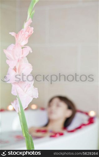 Young Woman Bathing at Health Spa
