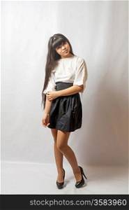 Young woman black skirt. Portrait of asian woman.