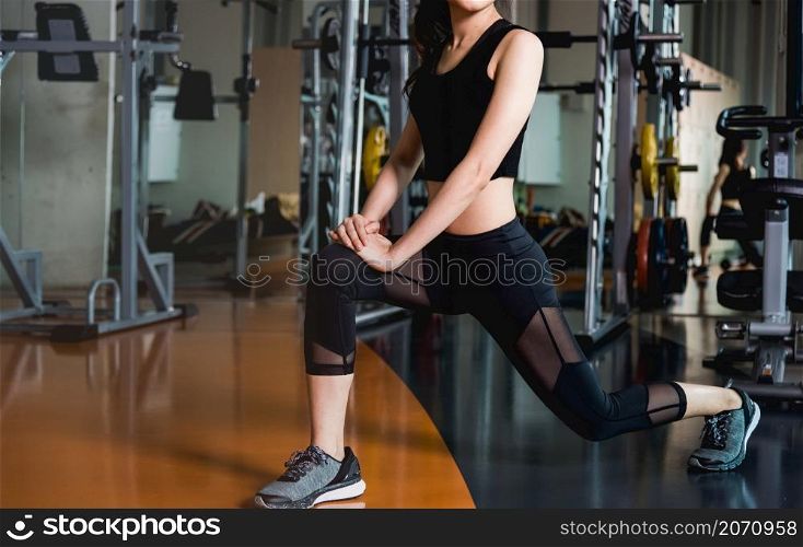 Young woman body lifestyle stretch stretching yoga before exercise workout at fitness gym