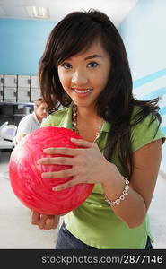 Young Woman Bowling