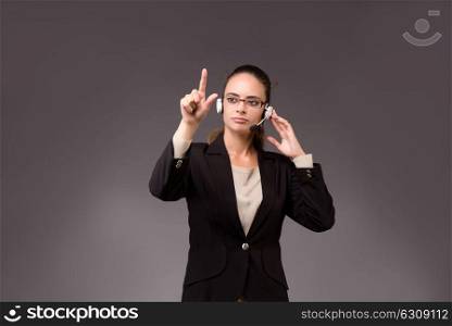 Young woman businesswoman pressing virtual buttons