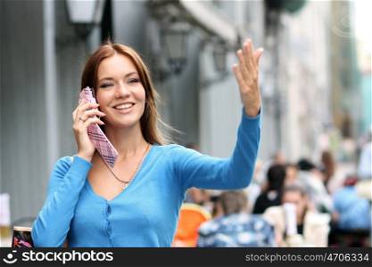 Young woman calling by phone