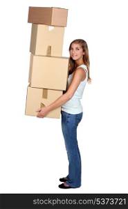 Young woman carrying boxes
