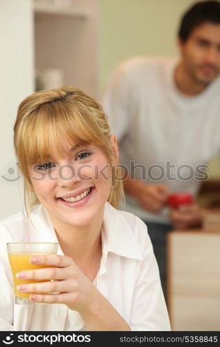 Young woman cheerful having breakfast