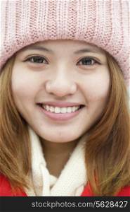 Young woman Close-up portrait in snow