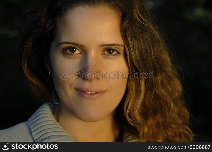 young woman close up portrait, outdoor picture
