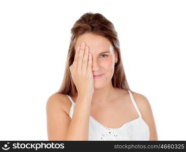 Young woman covering the half of her face isolated on a white background
