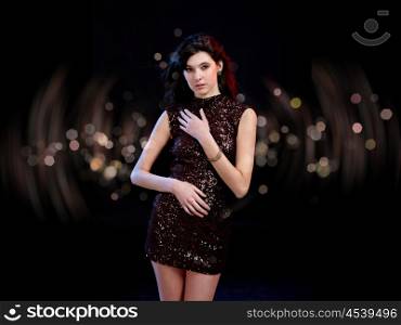 young woman dancing at disco or a night club