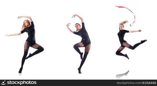 Young woman dancing on white background