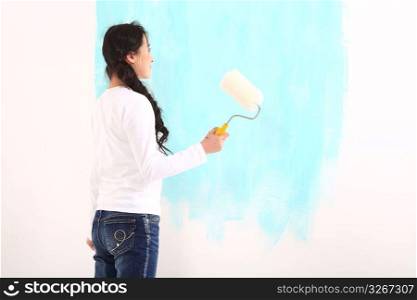 Young woman decorating