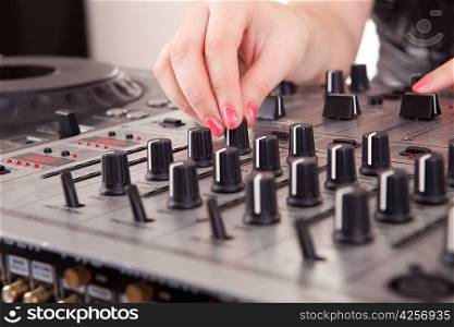 Young woman deejay at work
