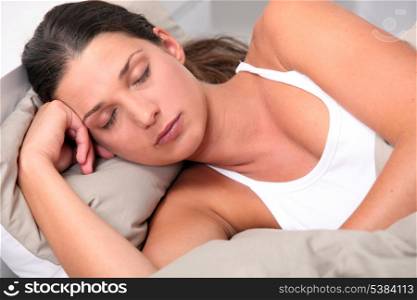 Young woman deeply asleep