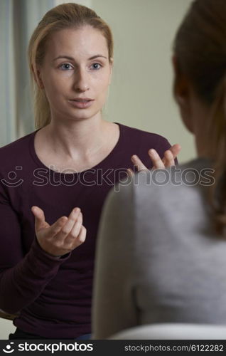 Young Woman Discussing Problems With Counselor
