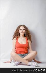 young woman do yoga meditation on white background her eyes open