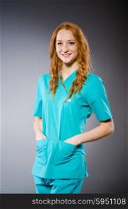 Young woman doctor in medical concept