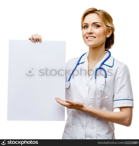 Young woman doctor isolated on white background holding blanc sign. Woman doctor standing on white background