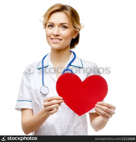 Young woman doctor isolated on white background holding heart. Woman doctor standing on white background