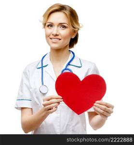 Young woman doctor isolated on white background holding heart. Woman doctor standing on white background