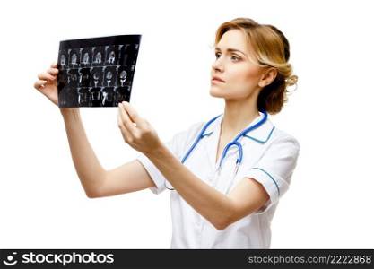Young woman doctor isolated on white background holding x-ray. Woman doctor standing on white background