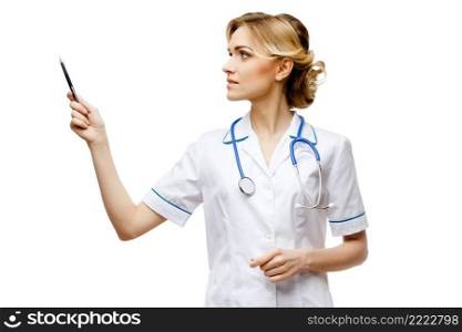 Young woman doctor isolated on white background showing on virtual screen. Woman doctor standing on white background