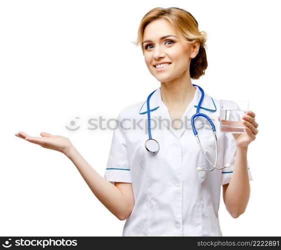 Young woman doctor isolated on white background. Woman doctor standing on white background