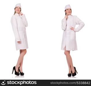 Young woman doctor isolated on white. The young woman doctor isolated on white