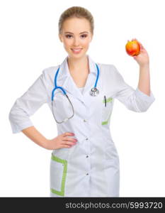 Young woman doctor with stethoscope and apple isolated