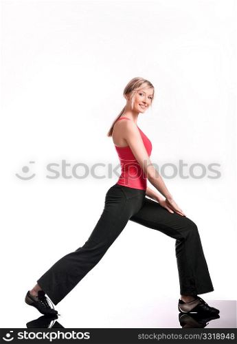 Young woman doing fitness exercise