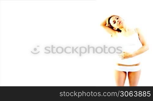 Young woman doing fitness stretching