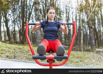 young woman doing outdoors excercises_2