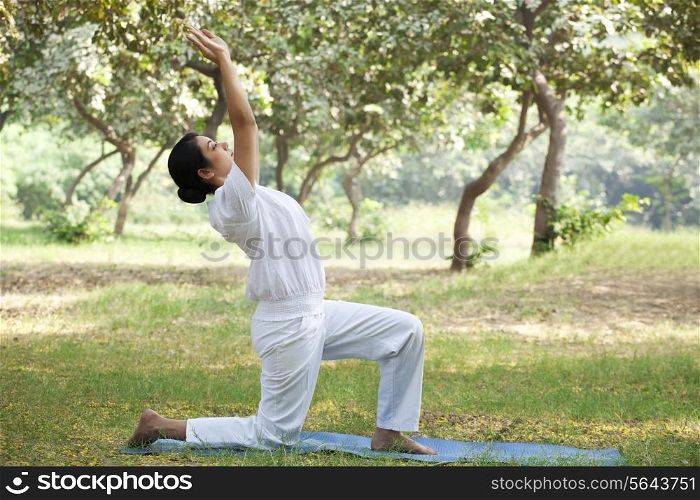 Young woman doing stretching exercise