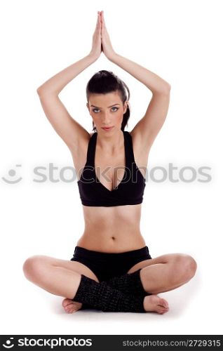 Young woman doing yoga exercise over white background