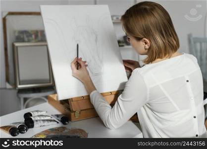 young woman drawing canvas 2