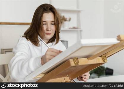 young woman drawing canvas 4