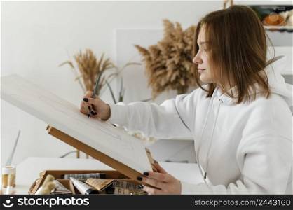 young woman drawing canvas 5