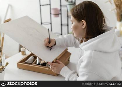 young woman drawing canvas 6